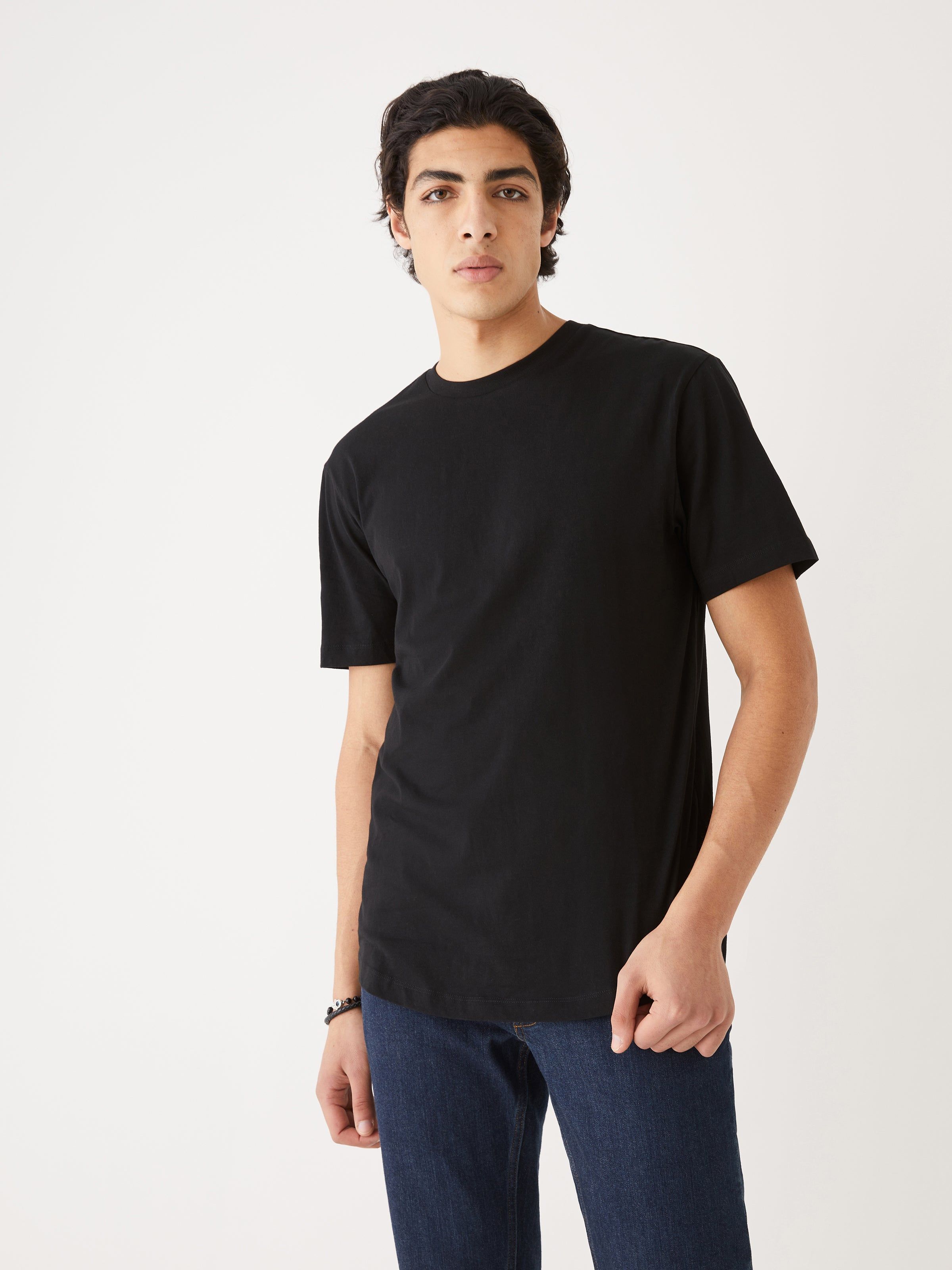 The Relaxed Arc Hem T-Shirt in Black sold by Frank & Oak
