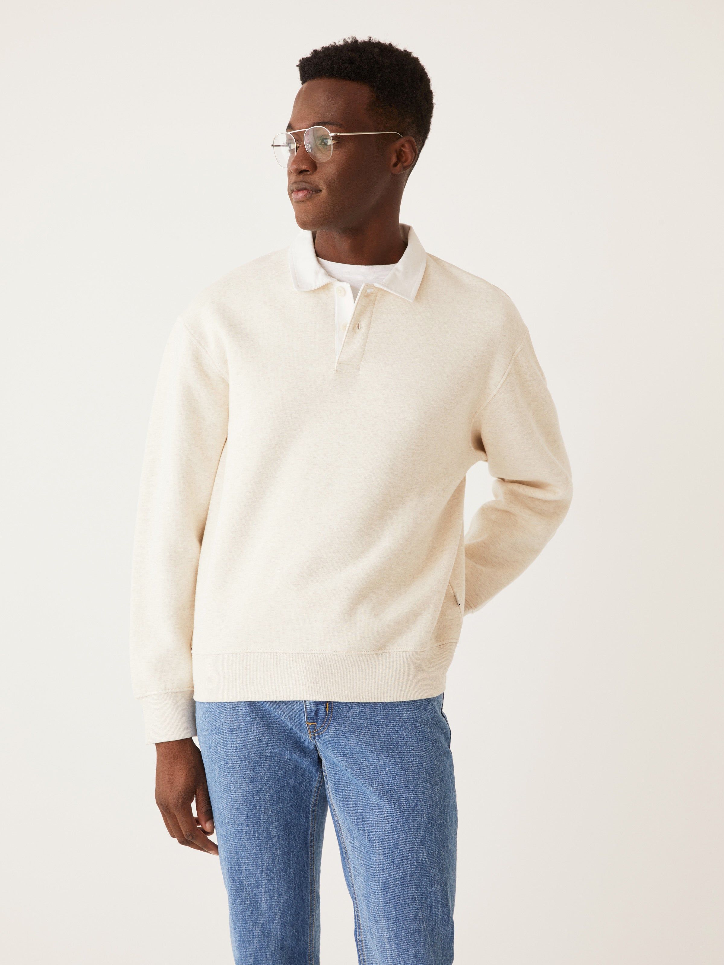 The Fleece Polo Sweater in White sold by Frank & Oak