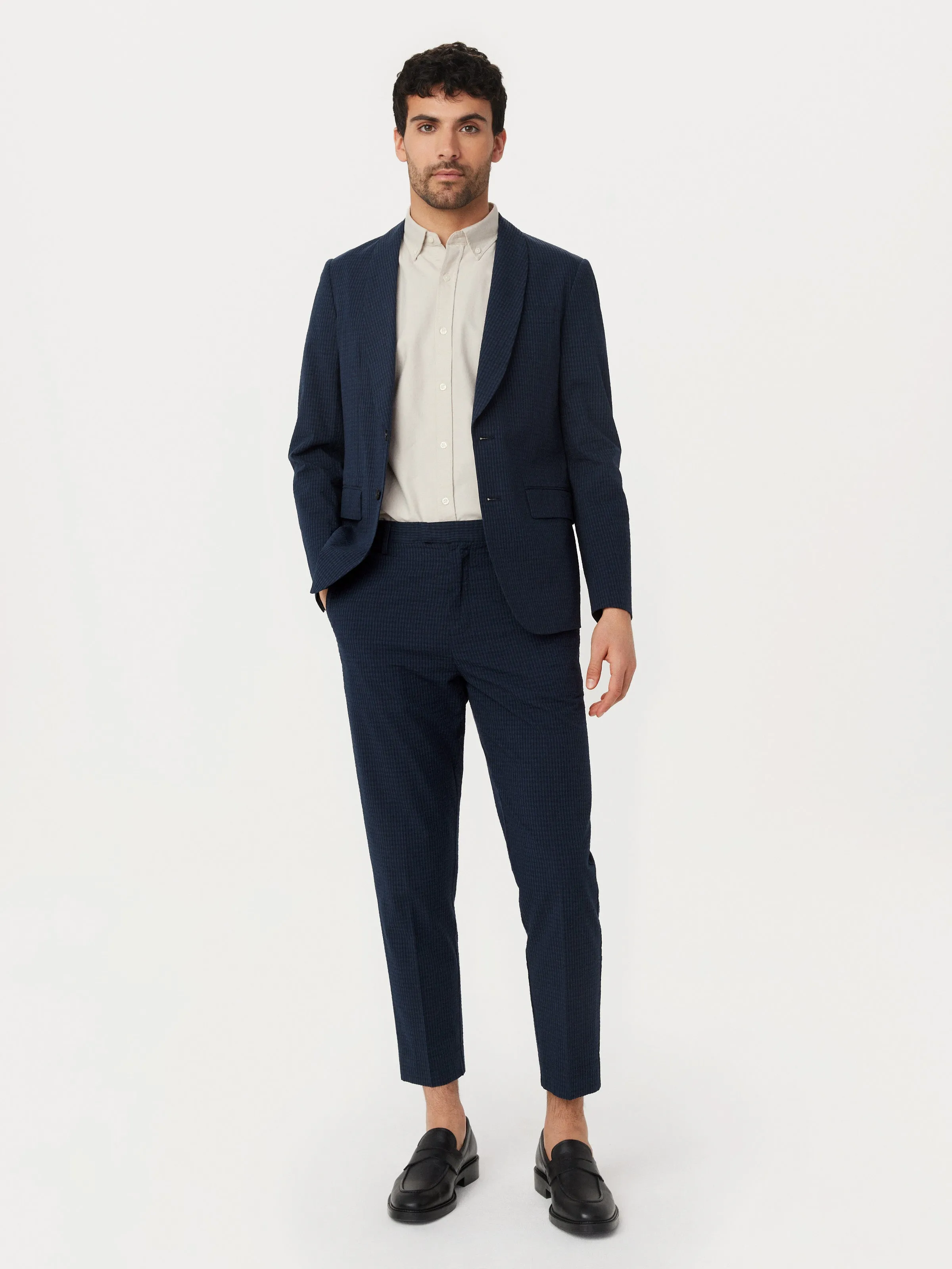 The Colin Tapered Seersucker Pant in Deep Blue sold by Frank & Oak