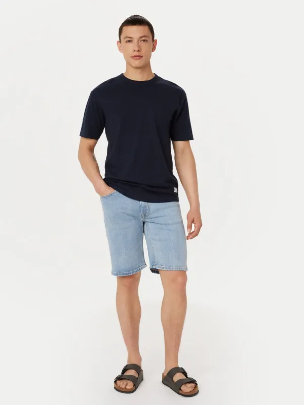 The Adam Slim 10in Short in Washed Blue sold by Frank & Oak