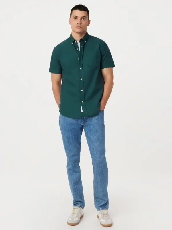 The Jasper Short Sleeve Oxford Shirt in Dark Cyprus sold by Frank & Oak