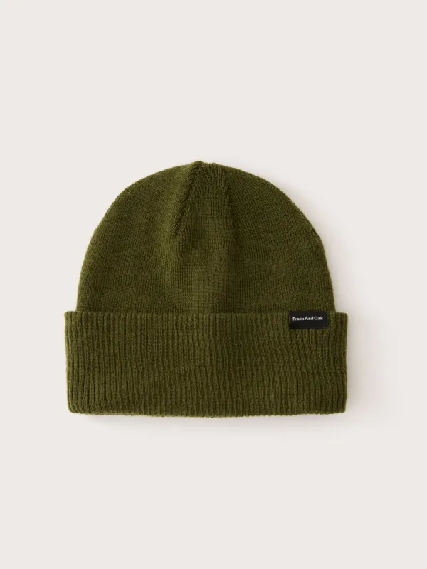 The Merino Wool Beanie in Dark Olive sold by Frank & Oak