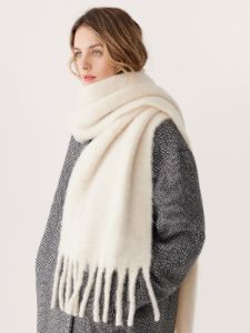 The Fuzzy Scarf in White sold by Frank & Oak