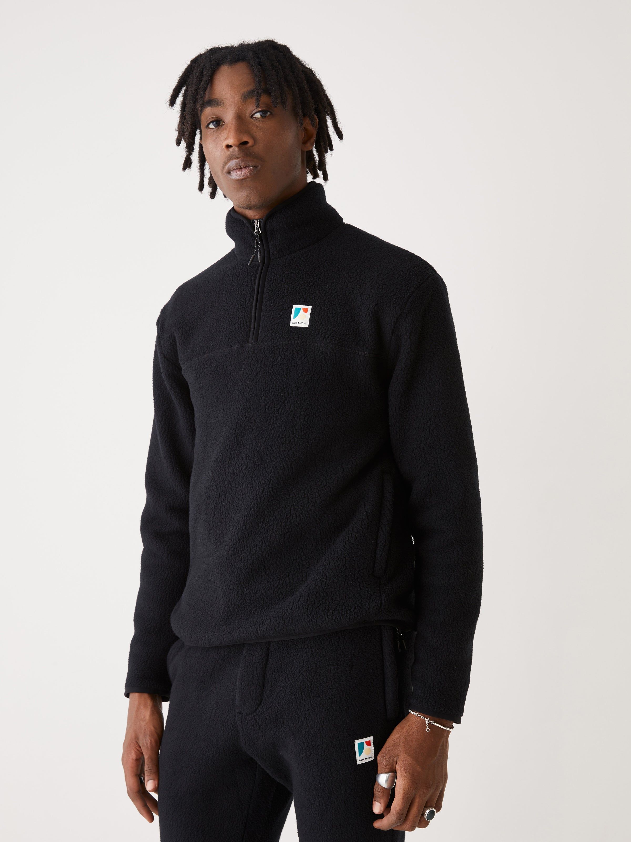 The Polar Fleece Pullover in Black sold by Frank & Oak