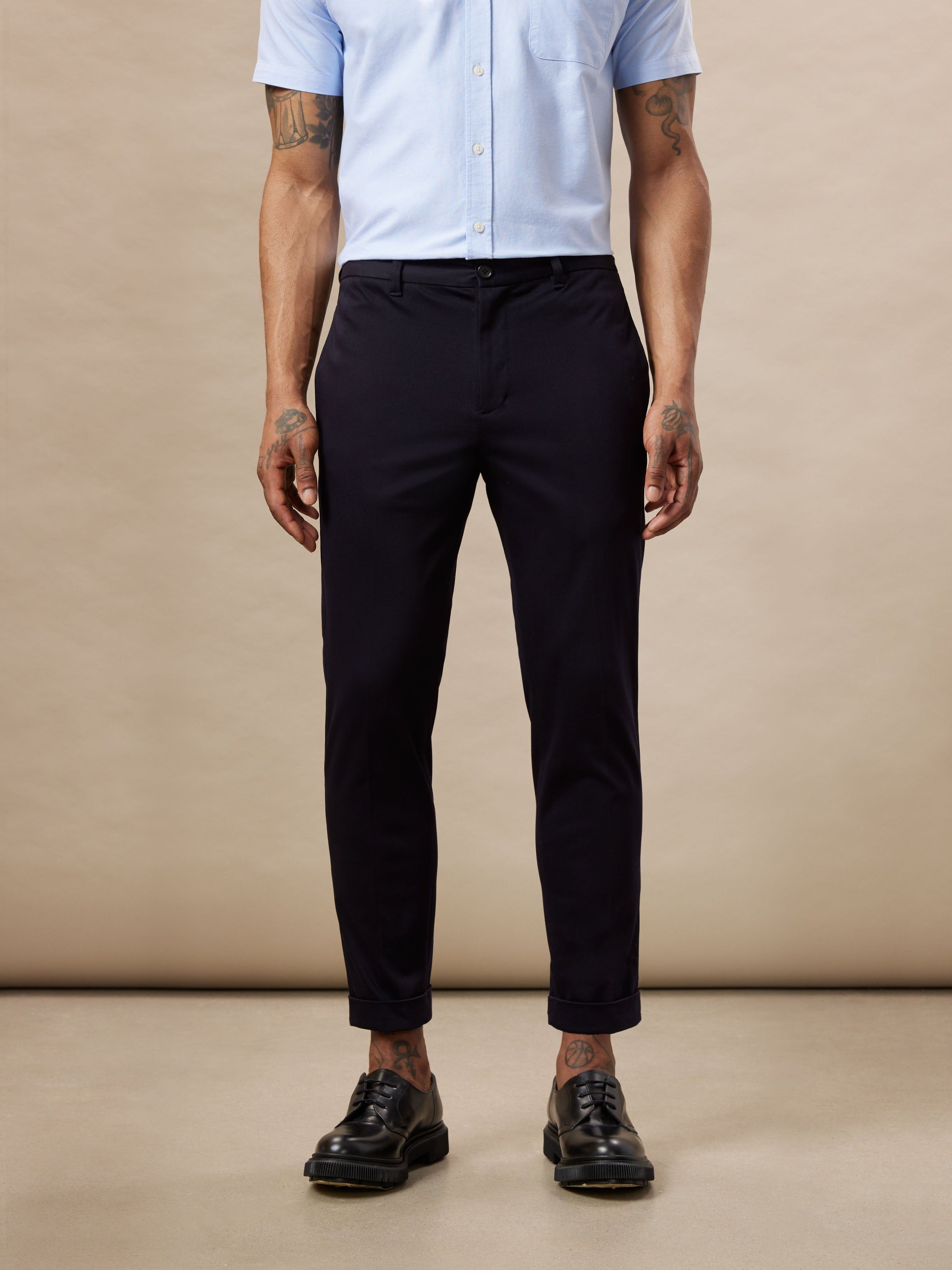 The Colin Tapered Fit Flex Pant in Navy sold by Frank & Oak