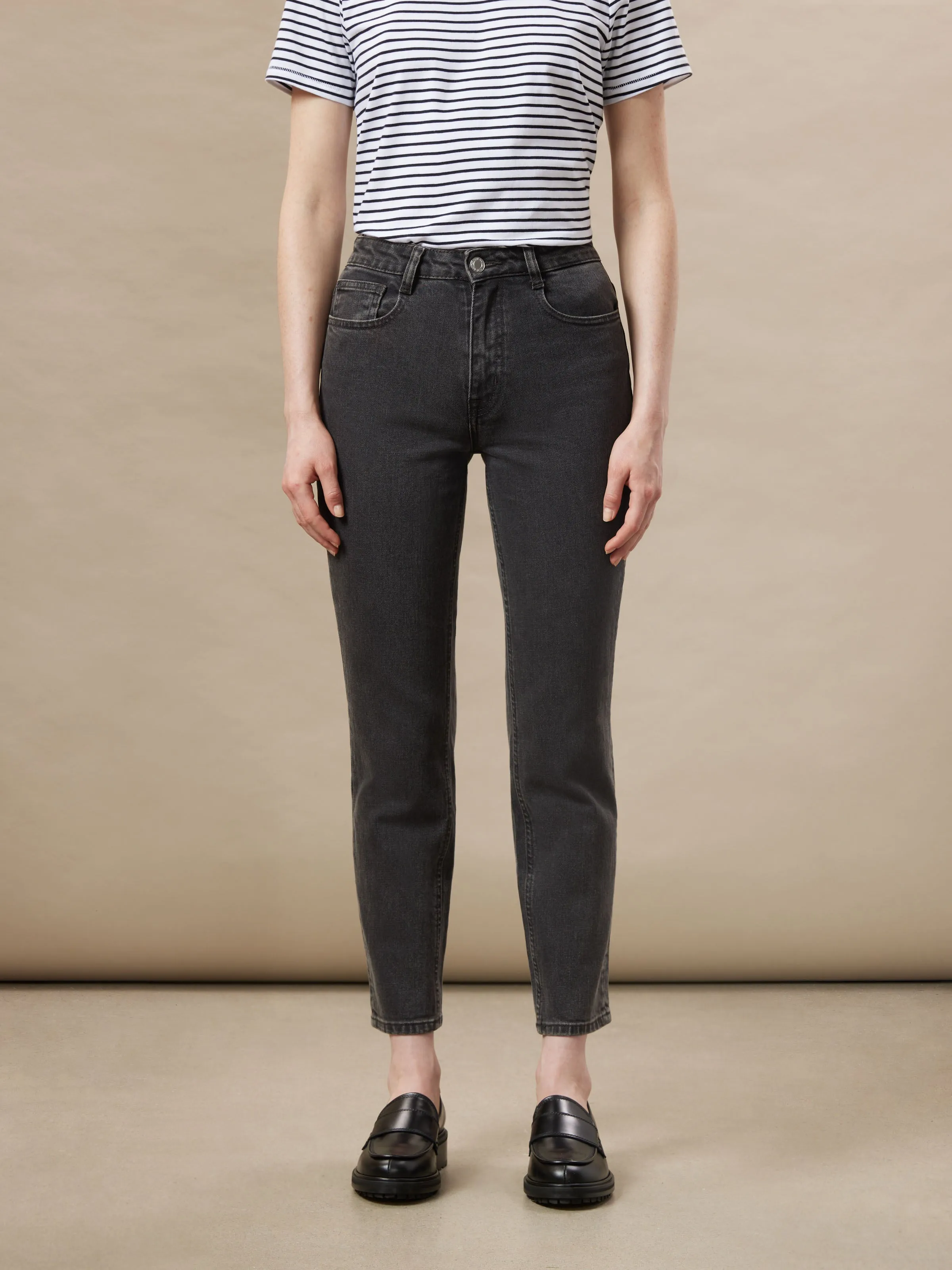 The Stevie Tapered Jean in Washed Black sold by Frank & Oak