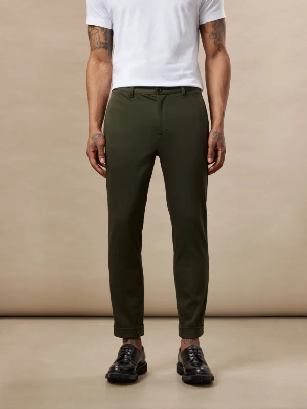 The Colin Tapered Flex Pant in Rosin sold by Frank & Oak