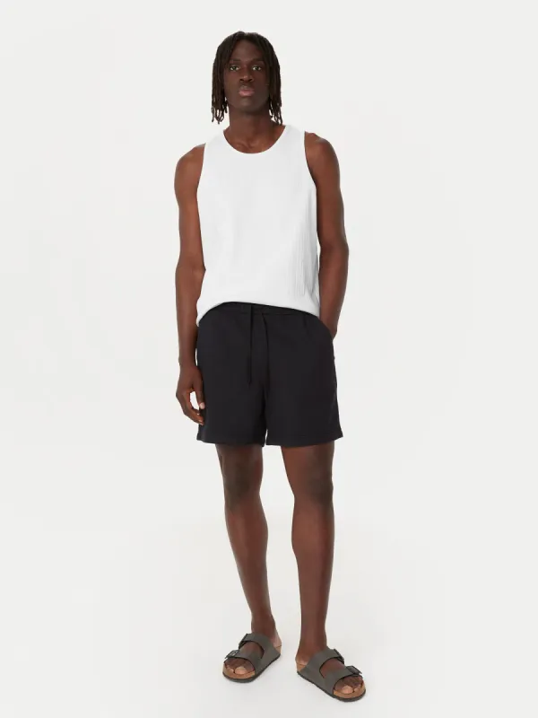 The Ribbed Tank in Bright White sold by Frank & Oak