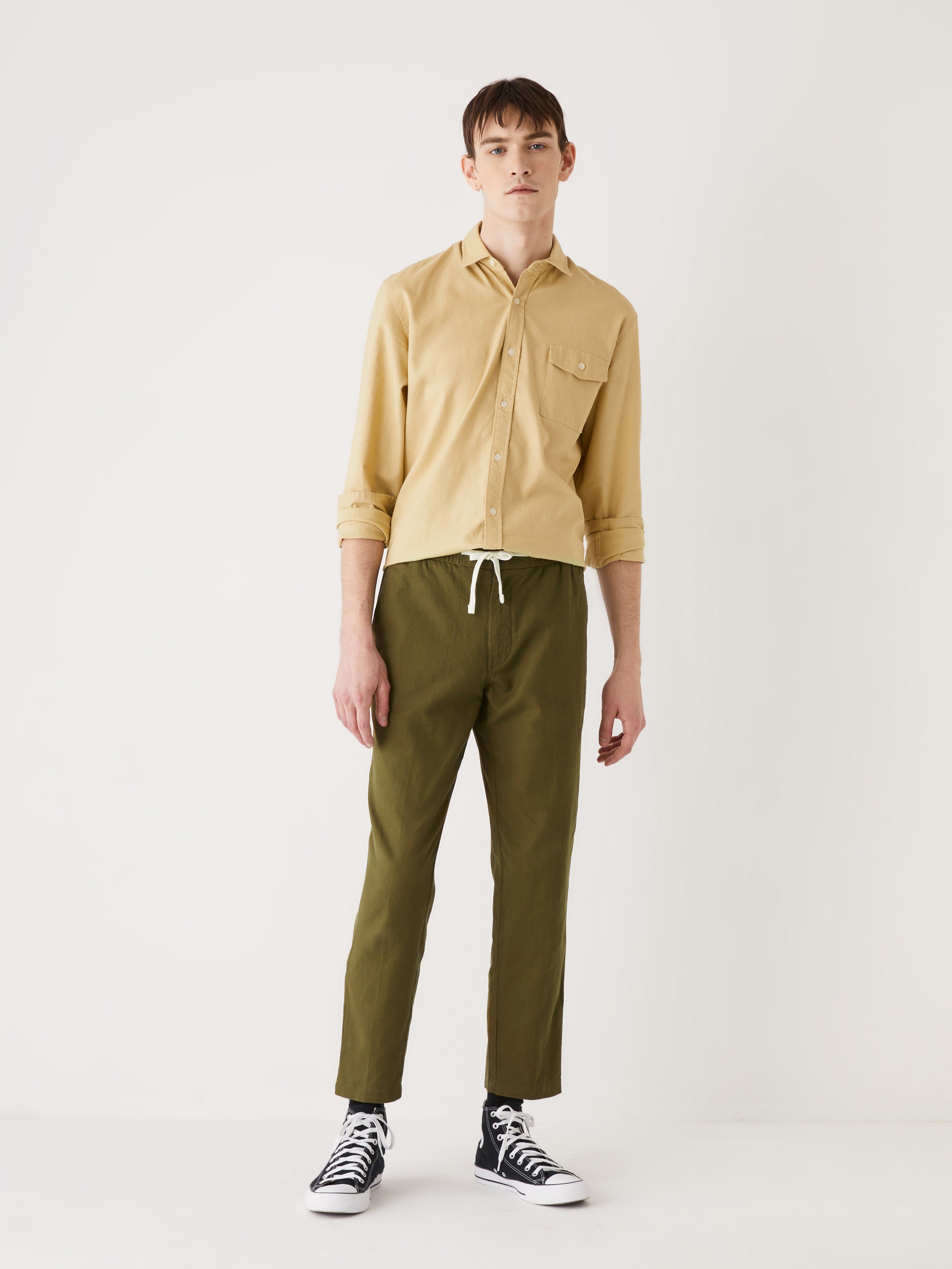 The Cropped Drawstring Pant in Dark Olive sold by Frank & Oak
