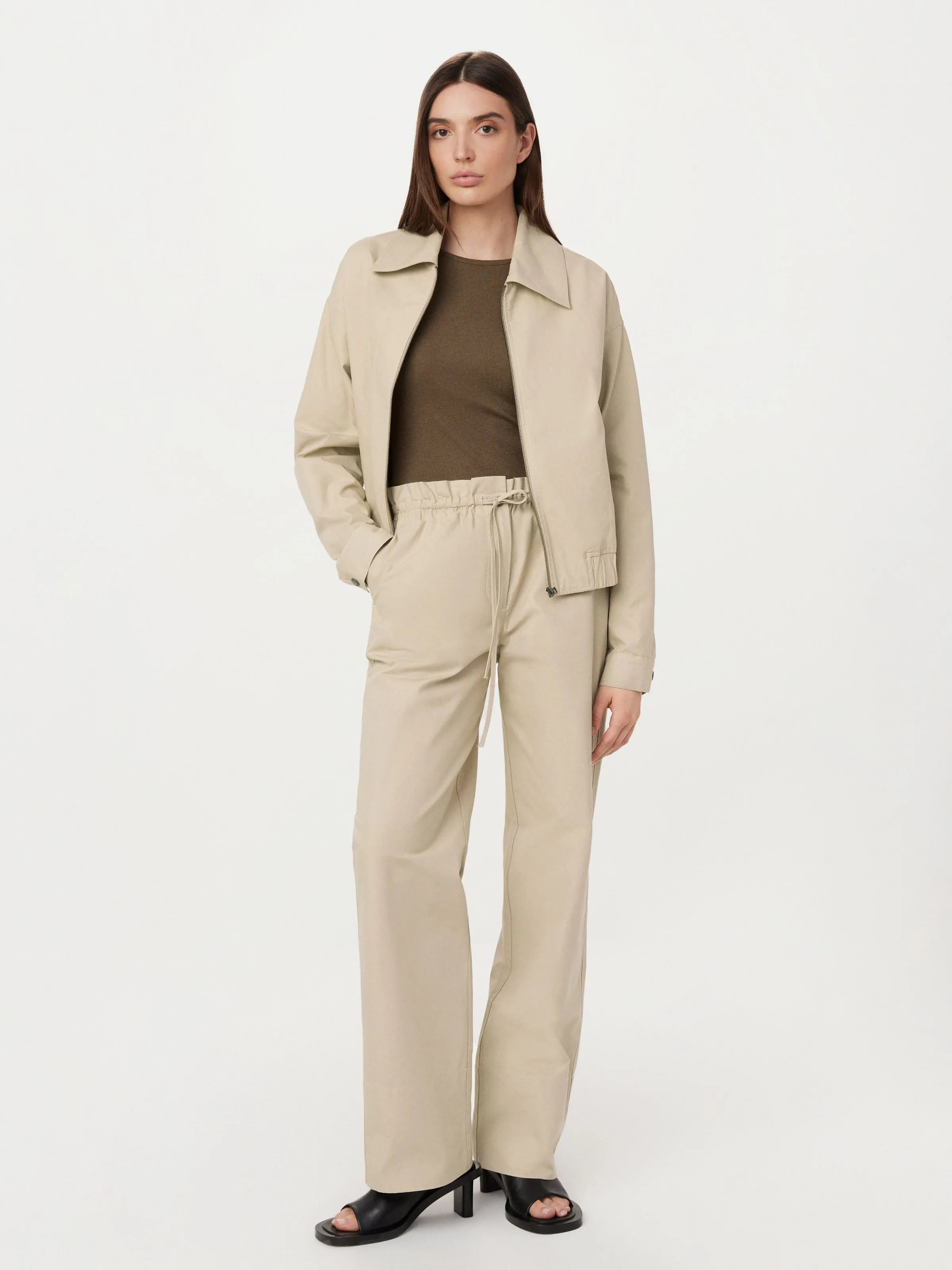 The Annie Paper Bag Loose Pant in Light Beige sold by Frank & Oak