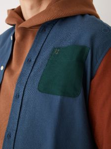 The Colour Block Jasper Oxford Shirt in Dark Blue sold by Frank & Oak