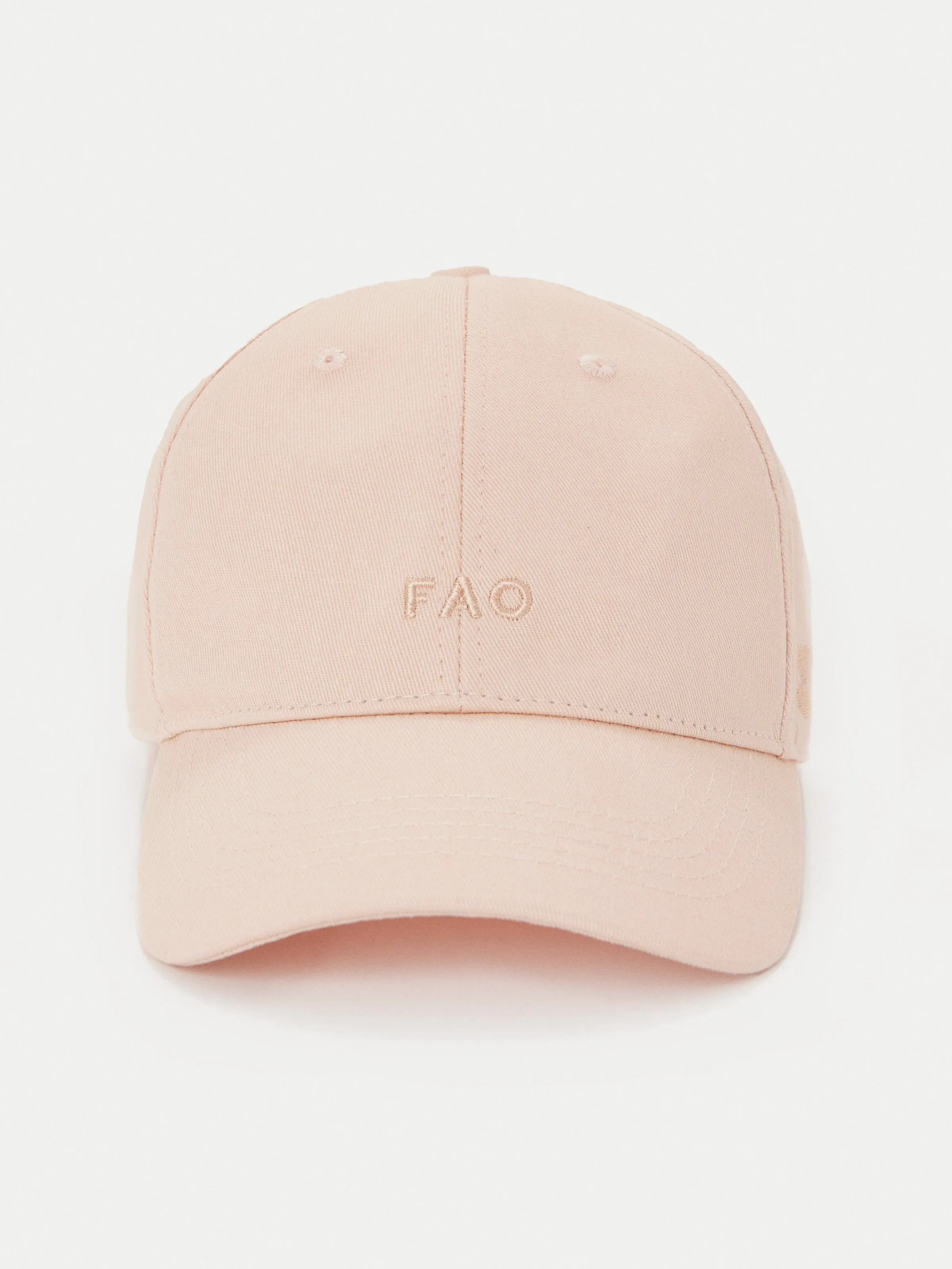 The Garment Dyed Dad Cap in Light Pink sold by Frank & Oak