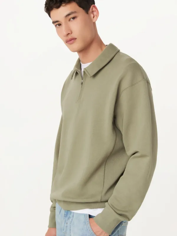 The Half Zip Sweatshirt in Vetiver Green sold by Frank & Oak