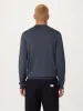 The Merino Polo Sweater in Steel Blue sold by Frank & Oak