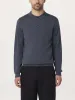 The Merino Polo Sweater in Steel Blue sold by Frank & Oak
