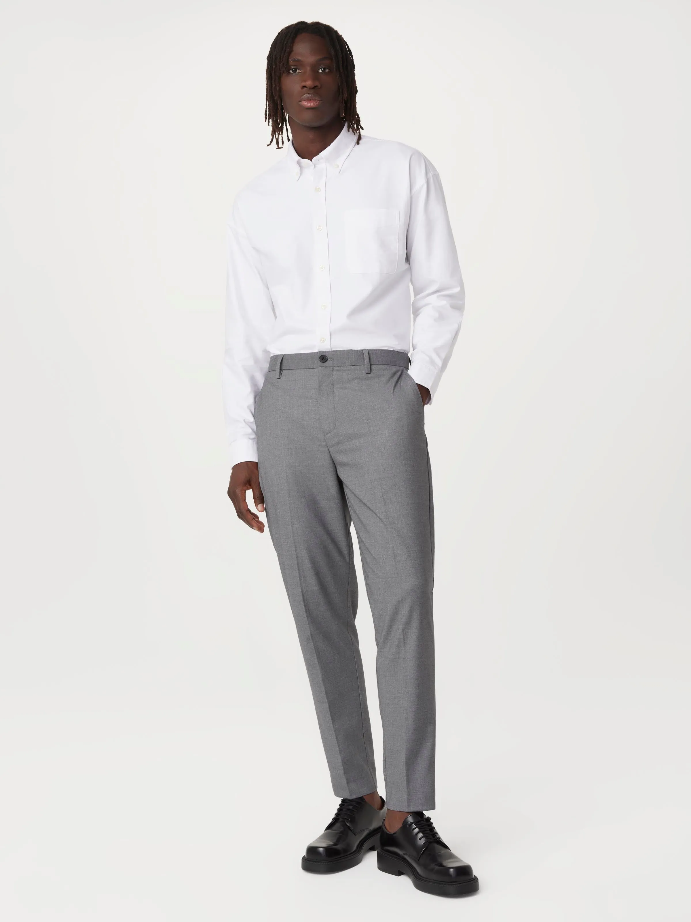 The Colin Tapered Pant in Grey sold by Frank & Oak