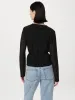 The Crossover Blouse in Black sold by Frank & Oak