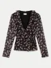 The Crossover Blouse in Black sold by Frank & Oak