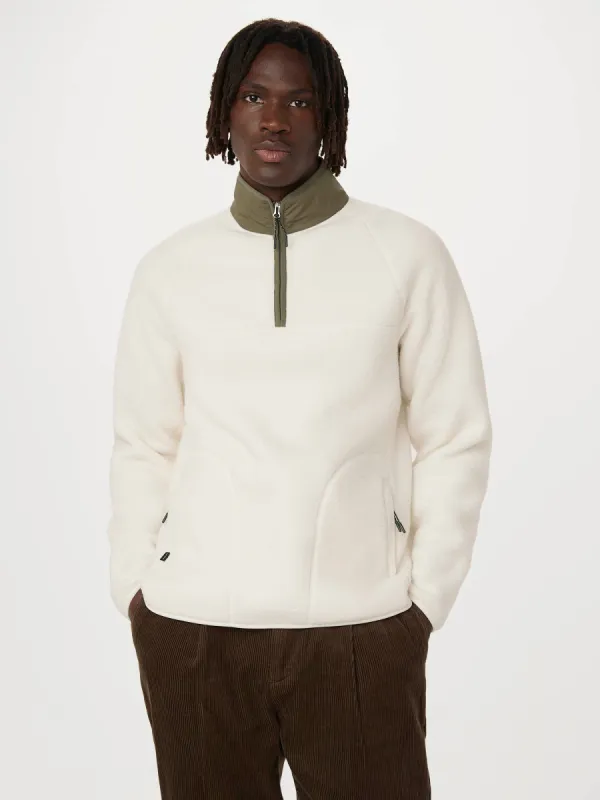 The Axis Polar Fleece Half Zip in Cloud sold by Frank & Oak