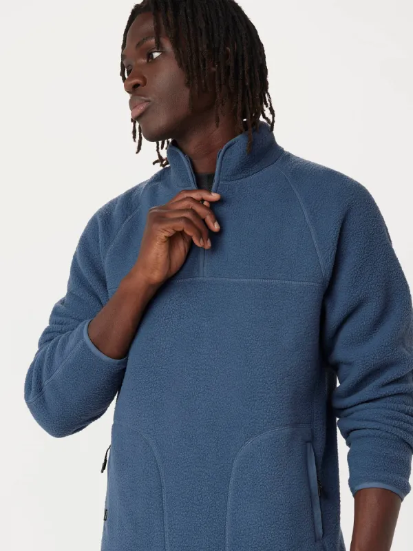 The Axis Polar Fleece Half Zip in Vintage Indigo sold by Frank & Oak