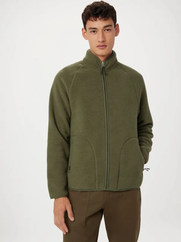 The Axis Polar Fleece Zip Up in Dark Olive sold by Frank & Oak