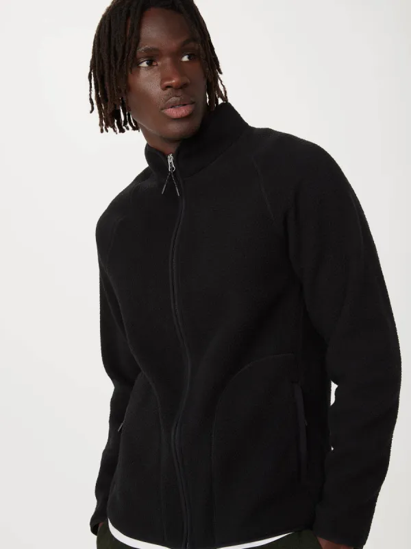 The Axis Polar Fleece Zip Up in Black sold by Frank & Oak