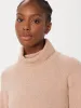 The Yak Wool Turtleneck in Blush Pink sold by Frank & Oak