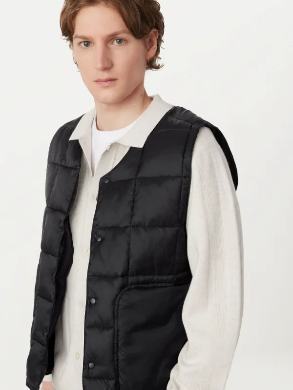 The Aero Packable Vest in Black sold by Frank & Oak