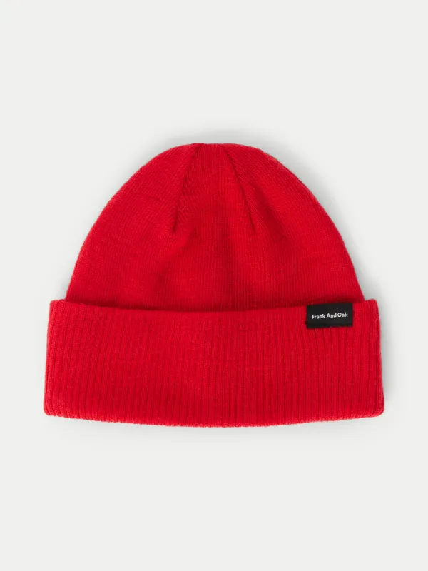 The Merino Wool Beanie in Bright Red sold by Frank & Oak