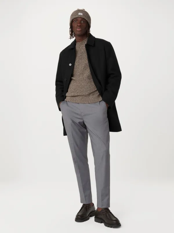 The Smith Mac Topcoat in Black sold by Frank & Oak