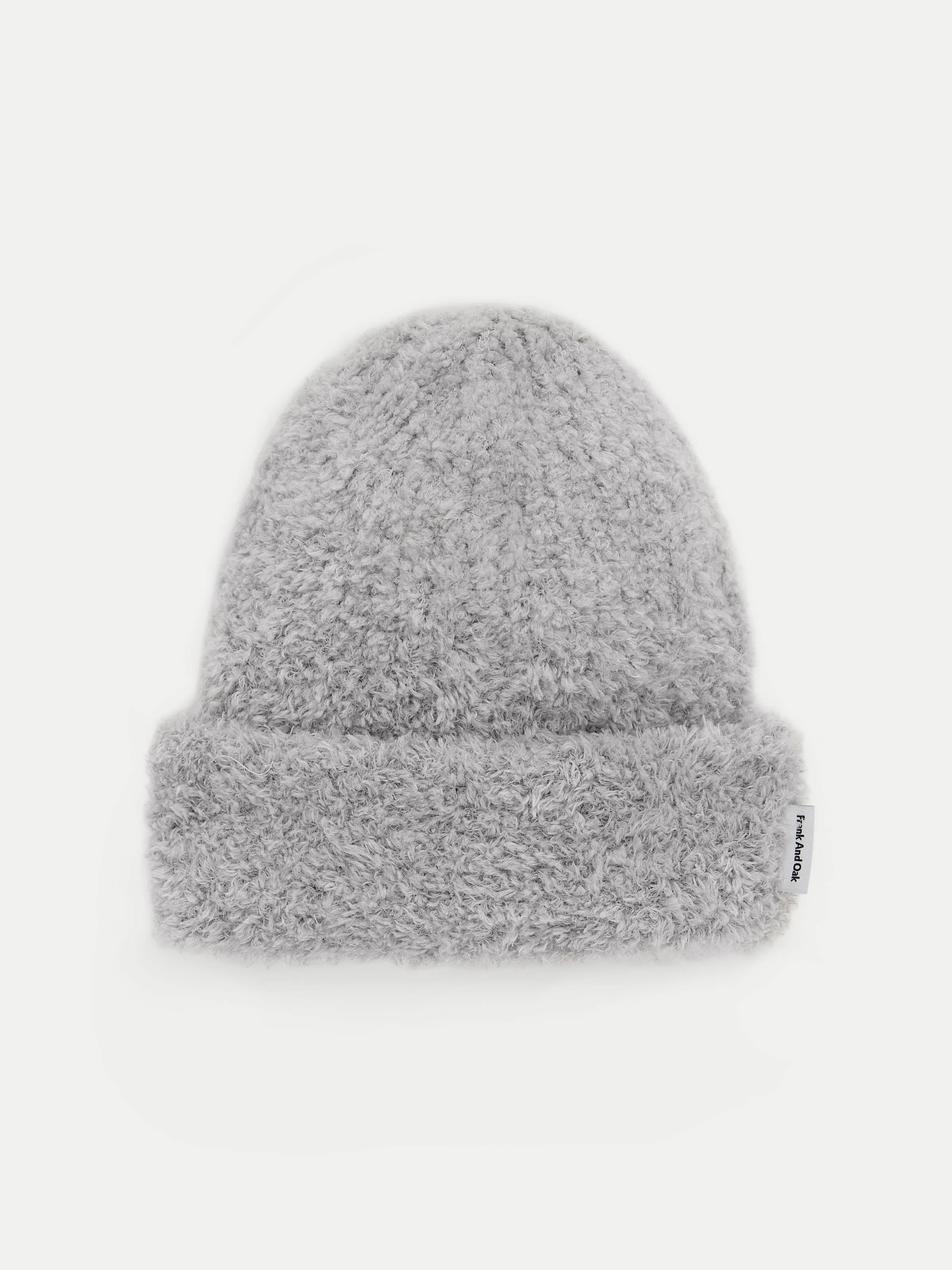 The Fuzzy Merino Wool Beanie in Light Grey sold by Frank & Oak