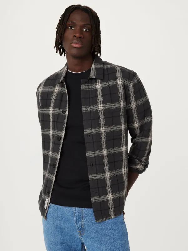 The Kapok Plaid Flannel Shirt in Dark Grey sold by Frank & Oak