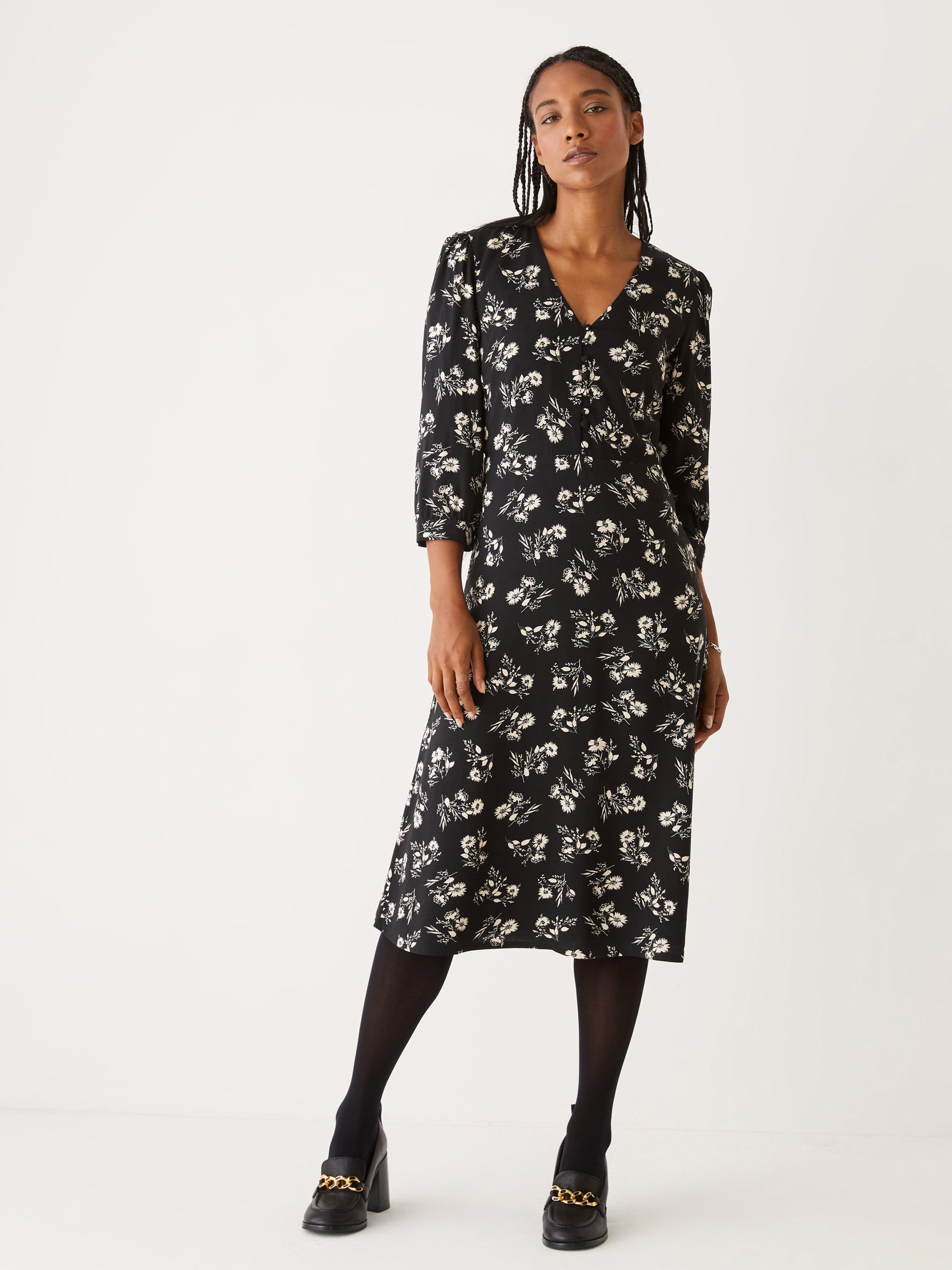 The Printed Puff Sleeve Dress in Black sold by Frank & Oak