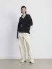 The Fuzzy V Neck Sweater in Dark Grey sold by Frank & Oak