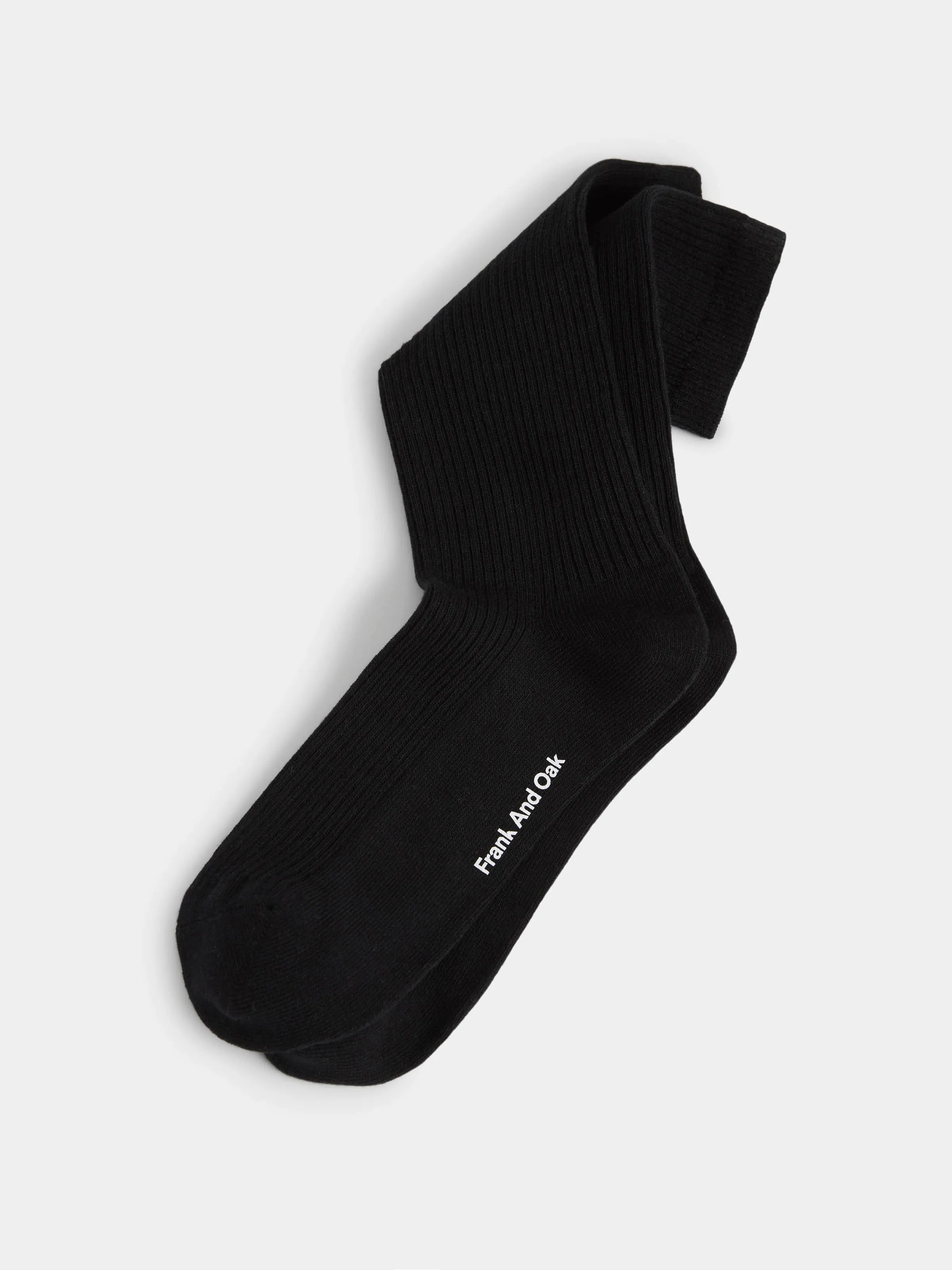 The Ribbed Socks in Black sold by Frank & Oak