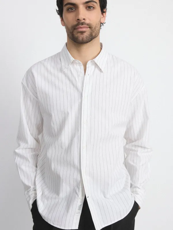 The Loose Pinstripe Shirt in White sold by Frank & Oak