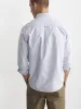 The Striped Jasper Oxford Shirt in Storm Blue sold by Frank & Oak