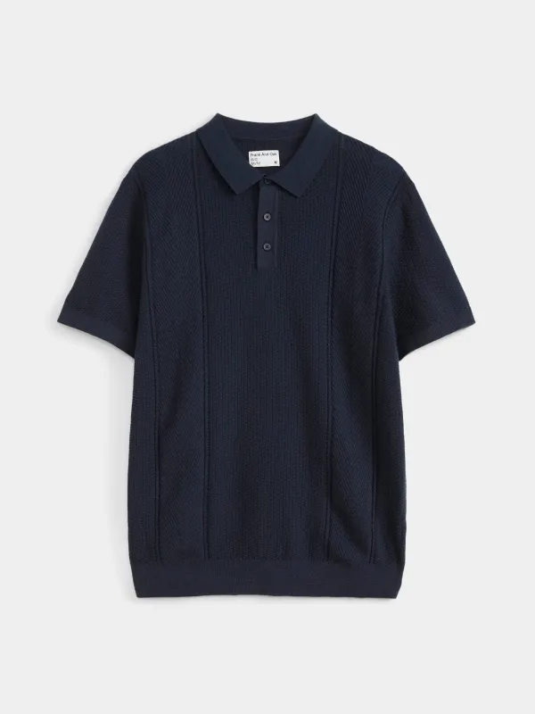 The Mixed Stitch Polo in Midnight Blue sold by Frank & Oak