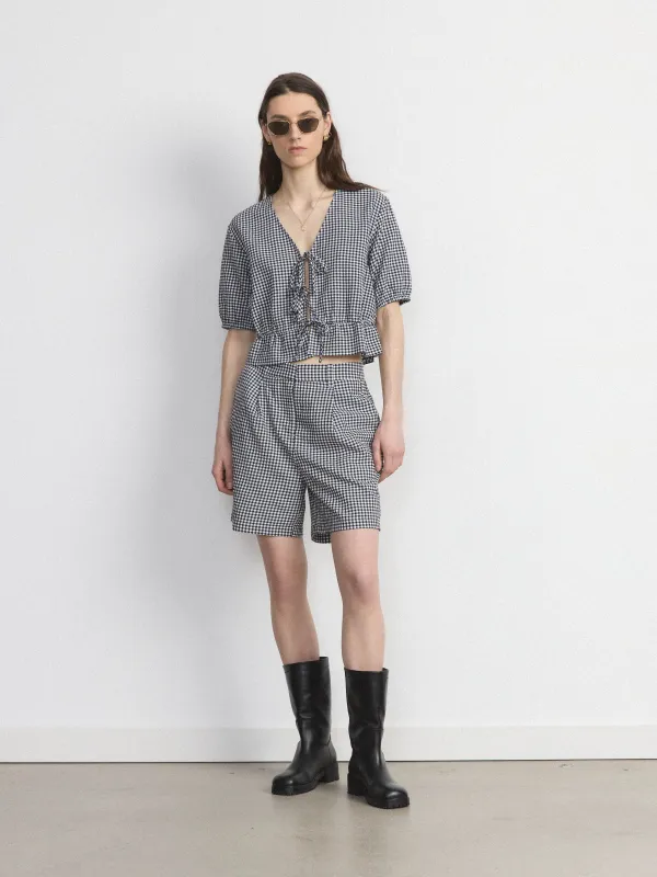 The Amelia Balloon Gingham Short in Black sold by Frank & Oak