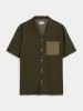 The Eco Dye Camp Collar Shirt in Deep Green sold by Frank & Oak