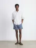 The Owen Light Corduroy Short in Storm Blue sold by Frank & Oak