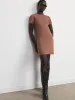 The Ribbed T-Shirt Dress in Café au lait sold by Frank & Oak