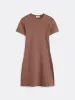 The Ribbed T-Shirt Dress in Café au lait sold by Frank & Oak
