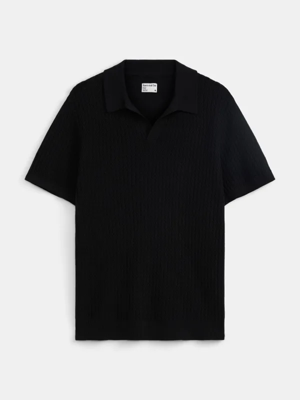 The Johnny Collar Polo in Black sold by Frank & Oak