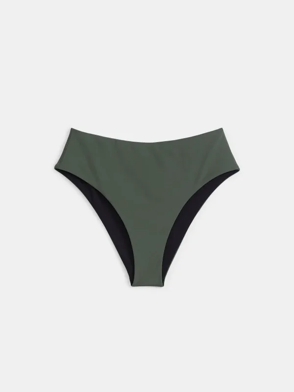The High Waist Reversible Bikini Bottom in Dark Green sold by Frank & Oak