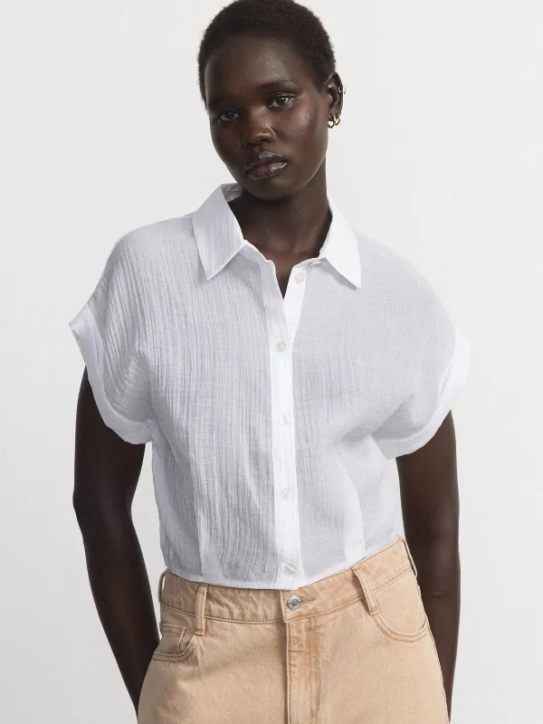 The Bubble Hem Blouse in White sold by Frank & Oak