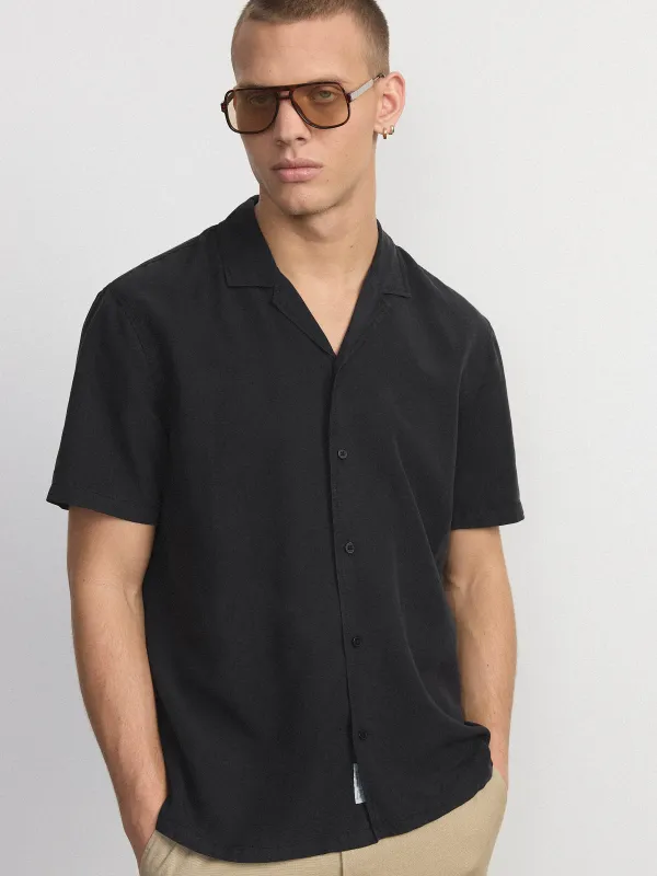 The Solid Camp Collar Shirt in Black sold by Frank & Oak