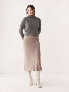 The Satin Midi Skirt in Champagne sold by Frank & Oak