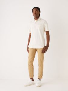 The Slim Fit Pique Polo Shirt in White sold by Frank & Oak