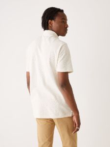 The Slim Fit Pique Polo Shirt in White sold by Frank & Oak